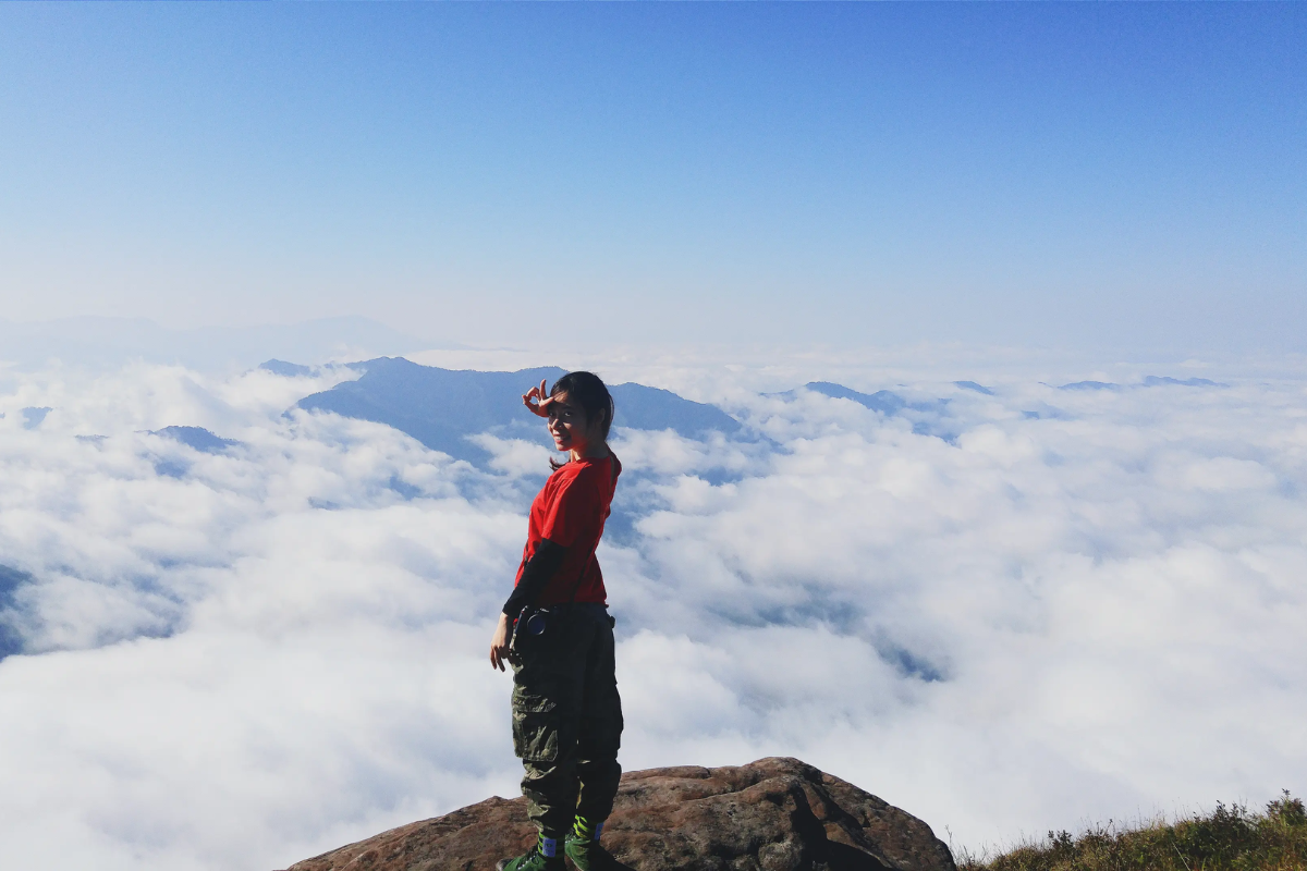 Misty mountain of Pha Luong during winter covered in fog and white clouds